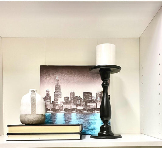 City Lights Art Set- Chicago Skyline canvas art, ceramic grey pot, black wood candle holder and books.